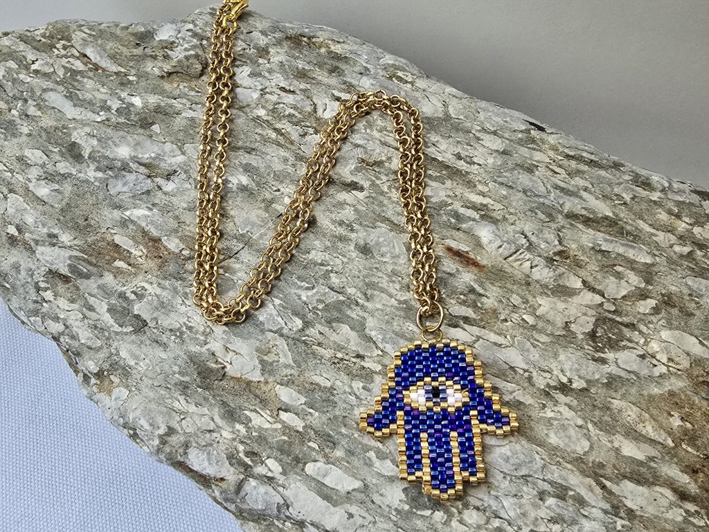 Goldene Hamsa